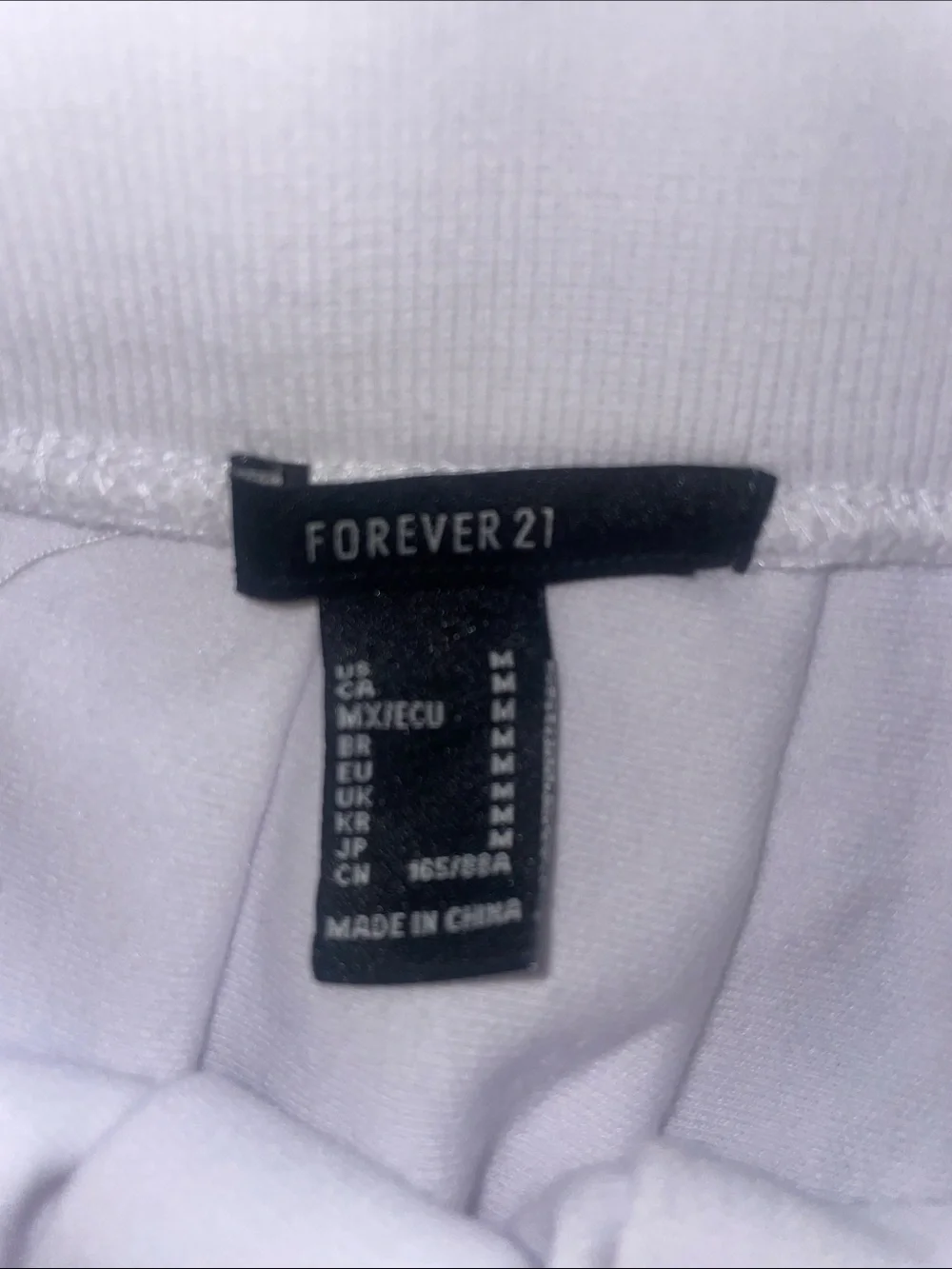 Forever 21 White Pleated Mini Skirt with Black-Trim Waistband